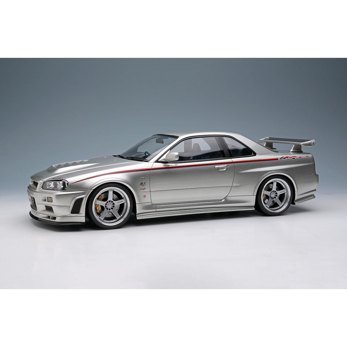 【予約安心出荷】[MDL] 1/18 日産 スカイライン GT-R(BNR34 NISMO R-tune Version) 2004 シルバー/ニスモストライプ 完成品 ミニカー(EML135A) EIDOLON(アイドロン)(2025年8月)