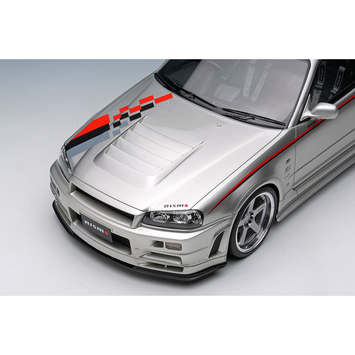 【予約安心出荷】[MDL] 1/18 日産 スカイライン GT-R(BNR34 NISMO R-tune Version) 2004 シルバー/ニスモストライプ 完成品 ミニカー(EML135A) EIDOLON(アイドロン)(2025年8月)