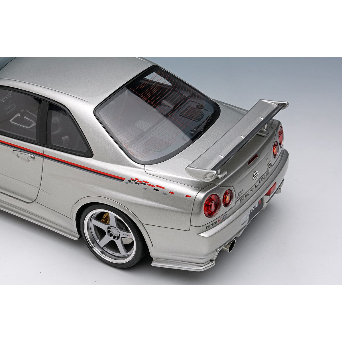 【予約安心出荷】[MDL] 1/18 日産 スカイライン GT-R(BNR34 NISMO R-tune Version) 2004 シルバー/ニスモストライプ 完成品 ミニカー(EML135A) EIDOLON(アイドロン)(2025年8月)