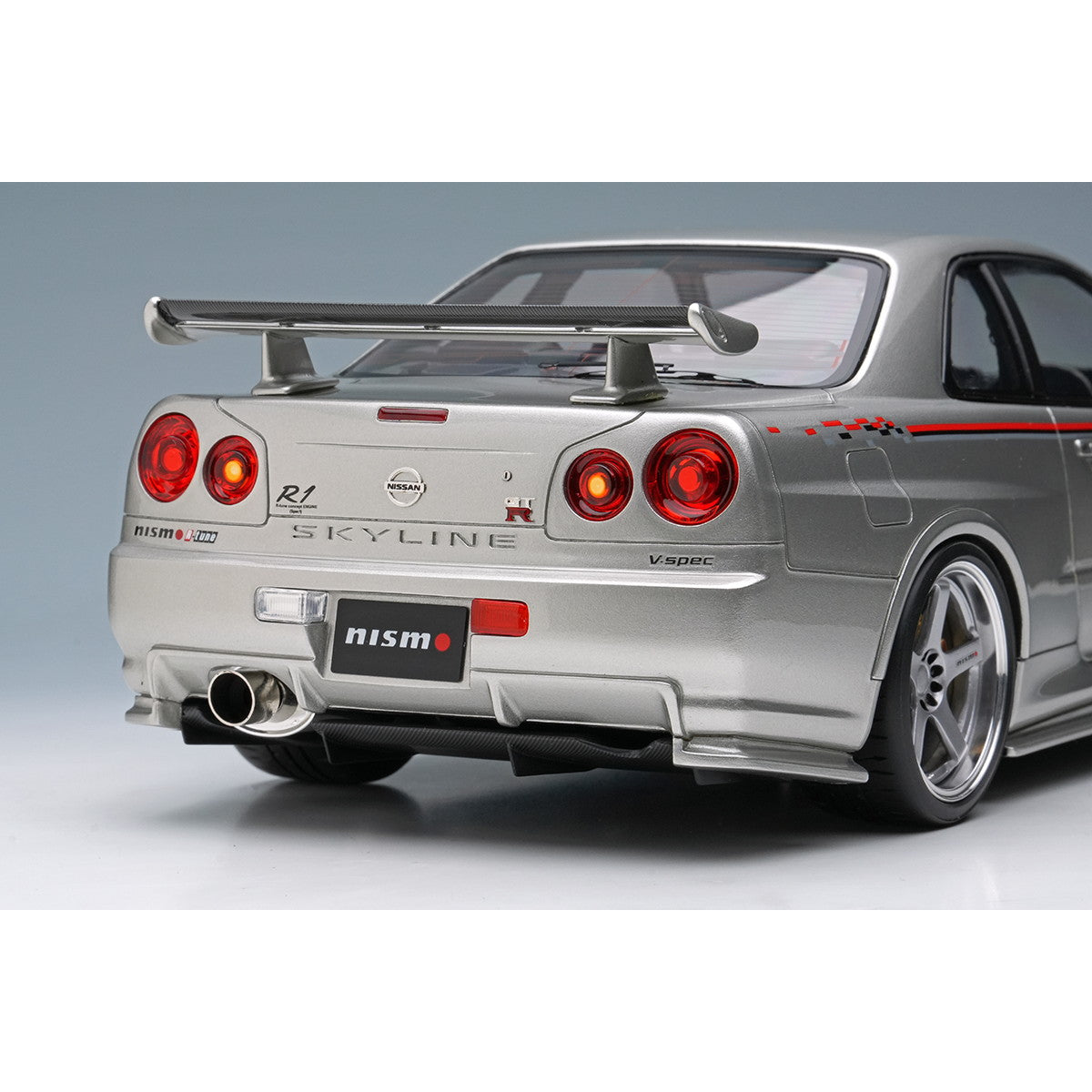 【予約安心出荷】[MDL] 1/18 日産 スカイライン GT-R(BNR34 NISMO R-tune Version) 2004 シルバー/ニスモストライプ 完成品 ミニカー(EML135A) EIDOLON(アイドロン)(2025年8月)