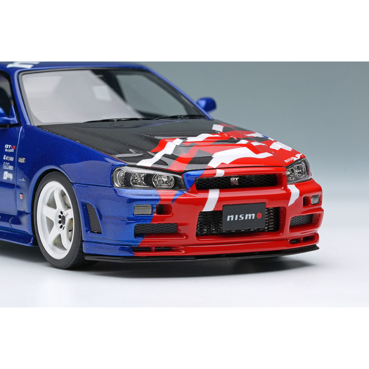 【新品即納】[MDL] 1/43 日産 スカイライン GT-R(BNR34 NISMO R-tune) ローンチバージョン 東京オートサロン2000 完成品 ミニカー(EM771) アイドロン(EIDOLON)(20250731)