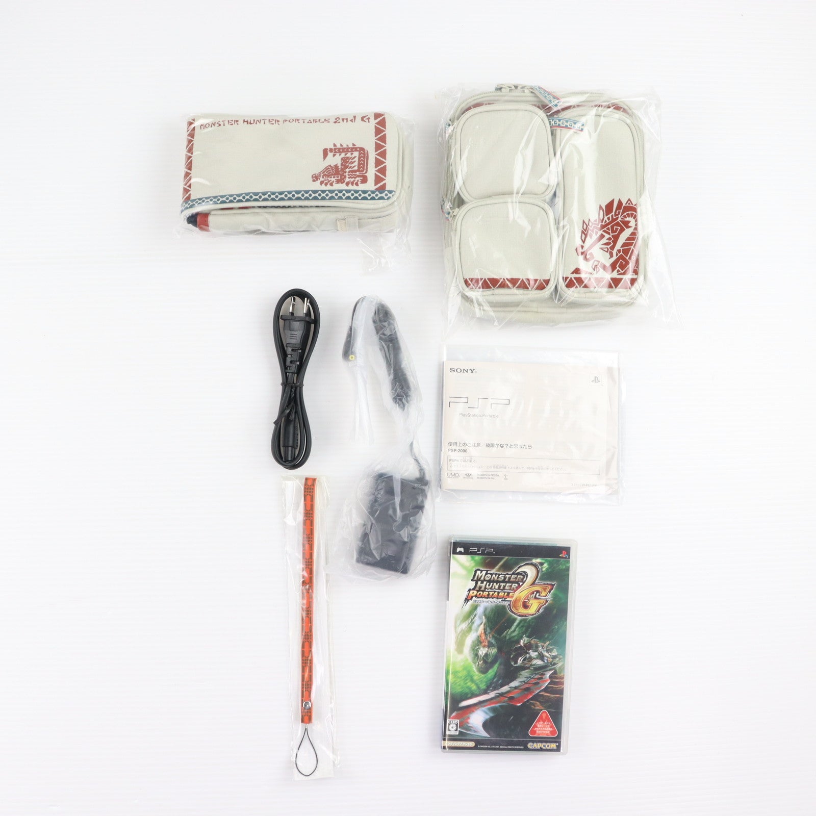 【中古即納】[PSP] (本体) モンスターハンターポータブル 2nd ハンターズパックG オリジナルデザイン本体(PSP-2000ZN)同梱版 カプコン(CPCS-01034)(20080327)