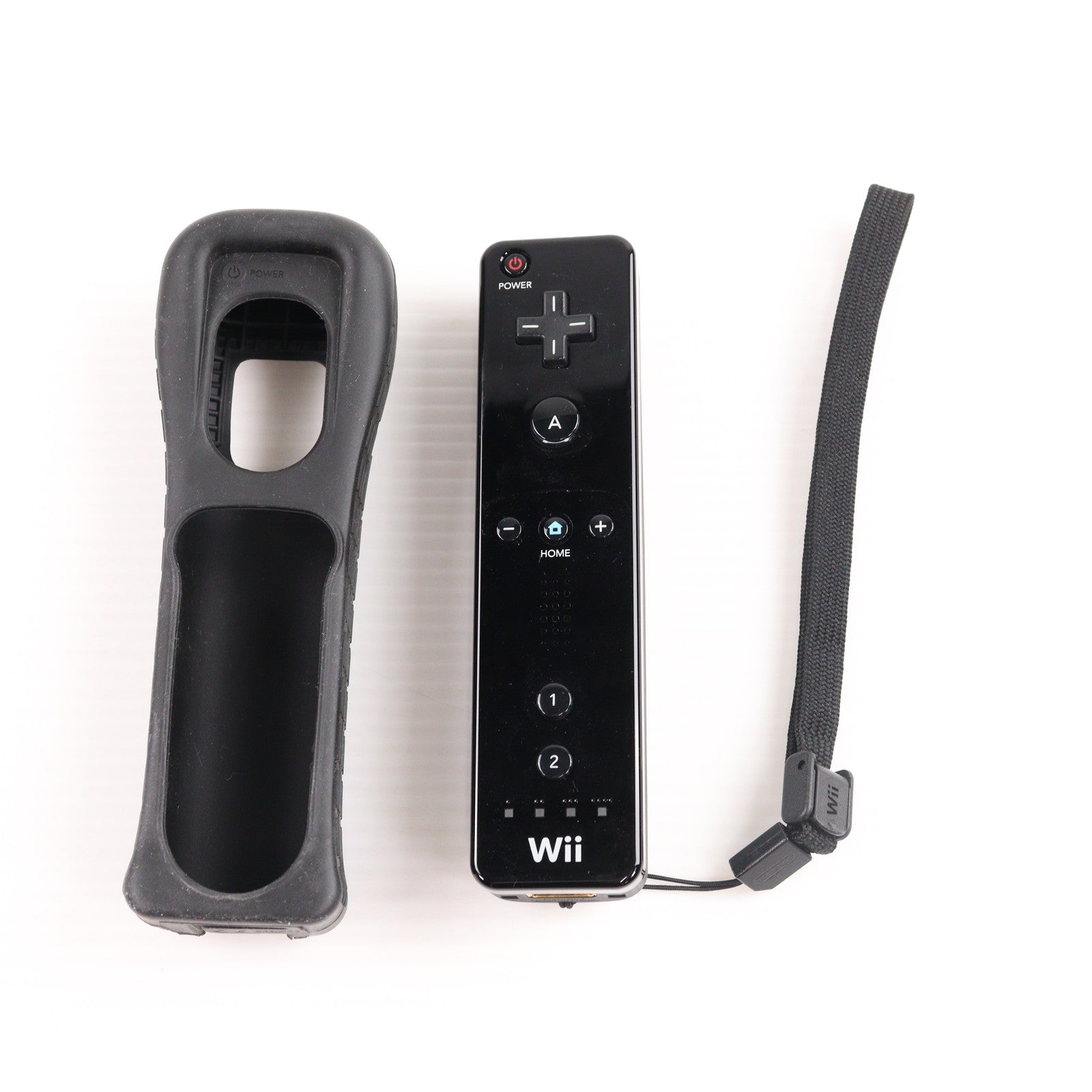 【中古即納】[ACC][Wii] Wiiリモコンジャケット・専用ストラップ付き Wiiリモコン(Wii Remote) クロ 任天堂(RVL-A-CJK)(20090801)